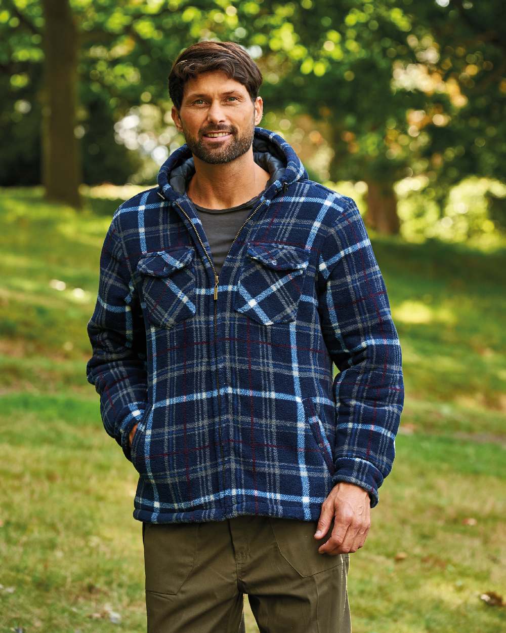 Blue coloured Champion Dumfries Mens Hooded Lumberjack Fleece Jacket on lawn background 