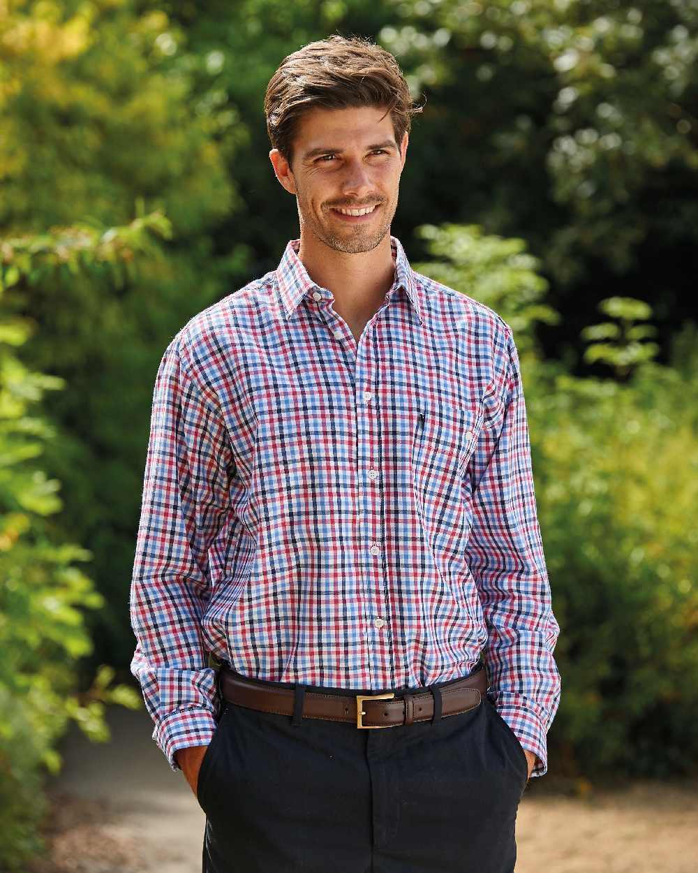 Red coloured Champion Lyndhurst Check Shirt on forest background 