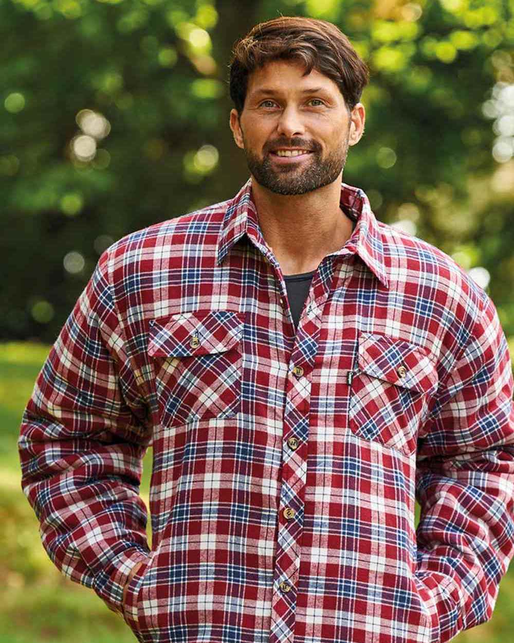 Red coloured Champion Pennine Fleece Lined Shirt on lawn background 