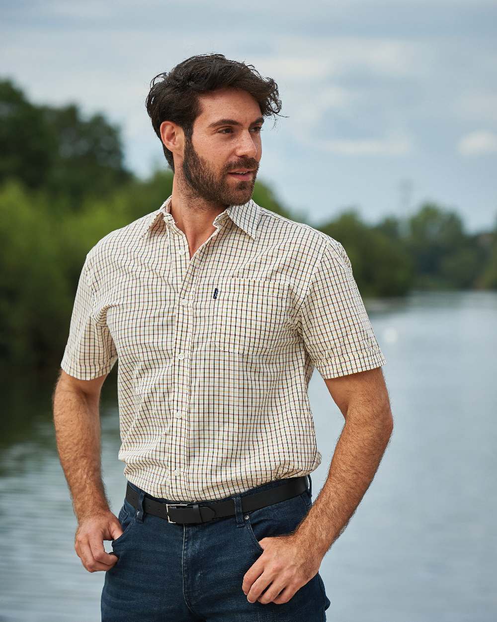 Red coloured Champion Tattersall Short Sleeved Shirt on river background 