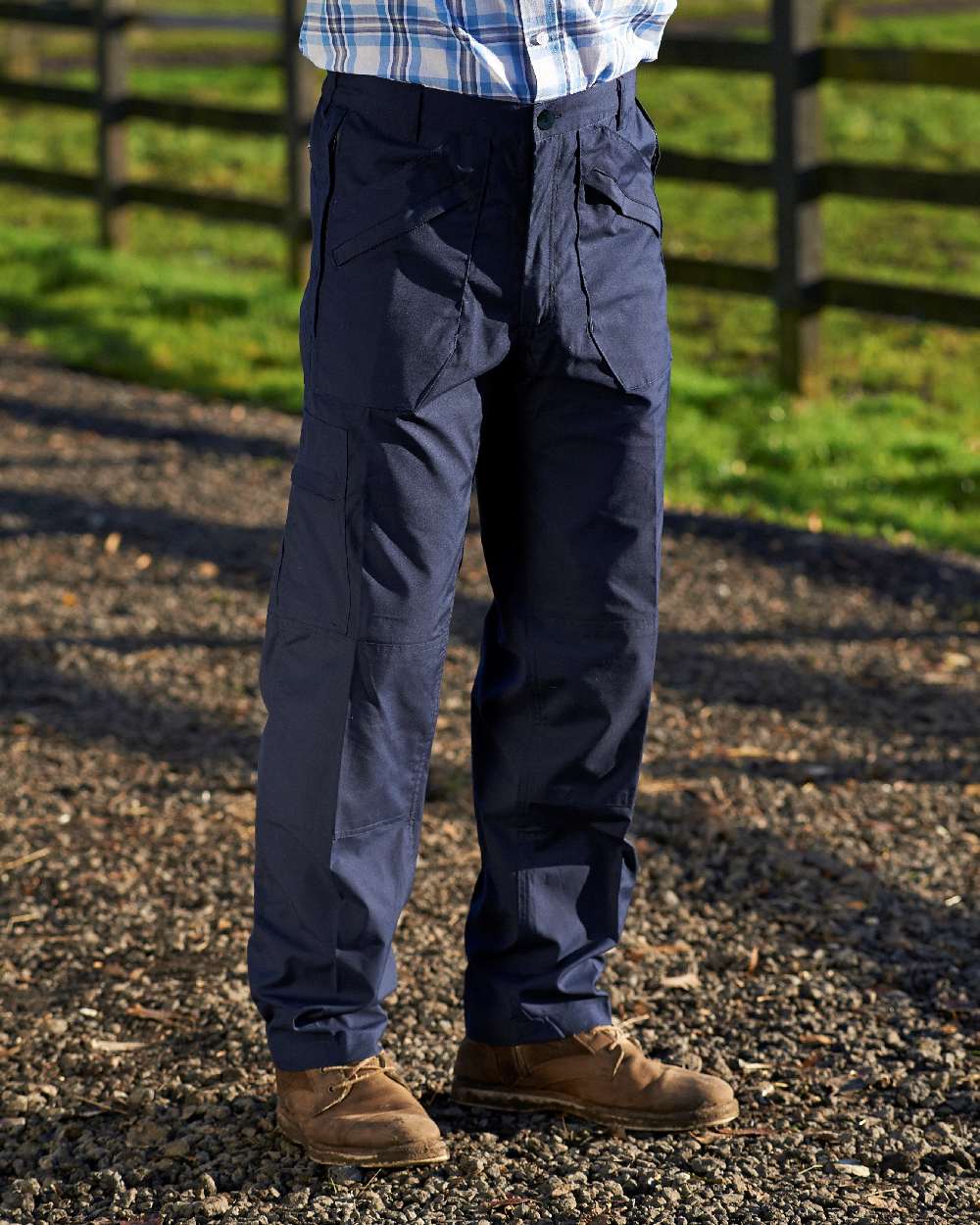 Navy coloured Champion Wenlock Multi Pocket Activity Trousers on farm background 
