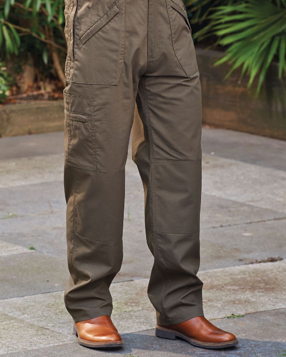 Olive coloured Champion Wenlock Multi Pocket Activity Trousers on street background 