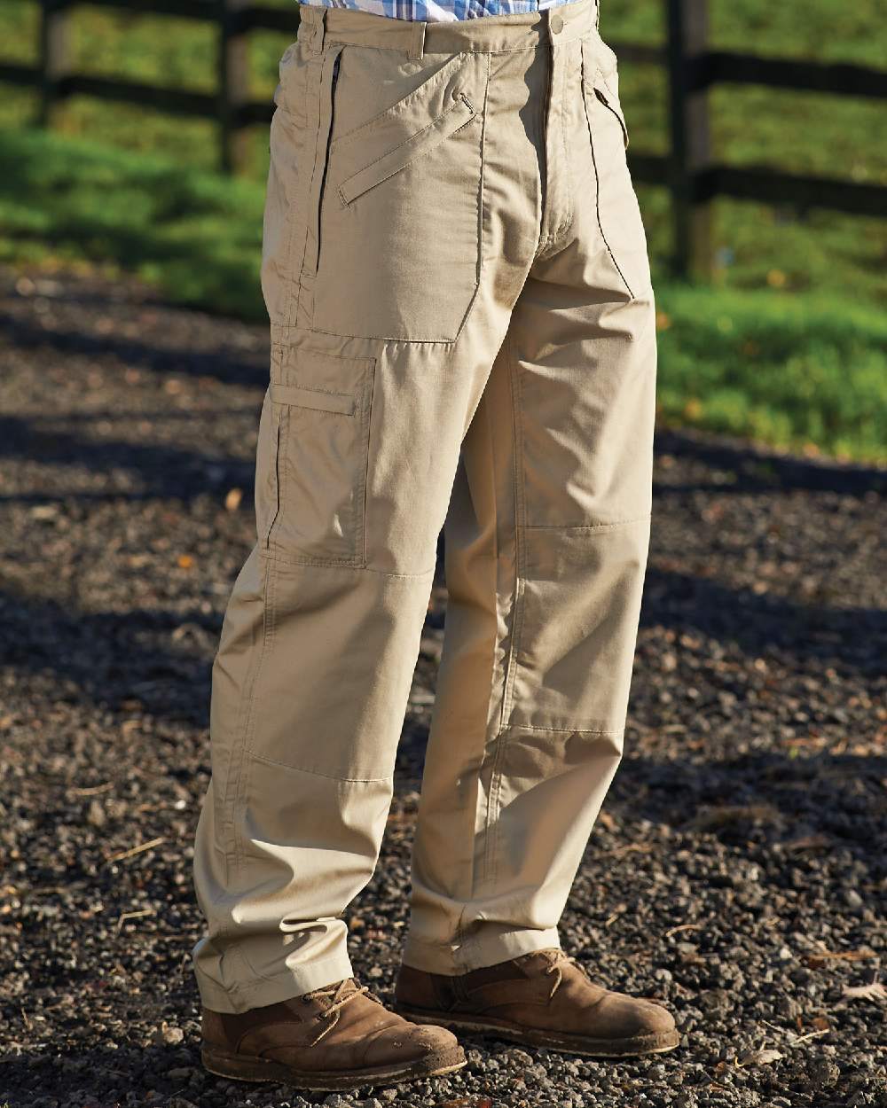 Stone coloured Champion Wenlock Multi Pocket Activity Trousers on farm background 