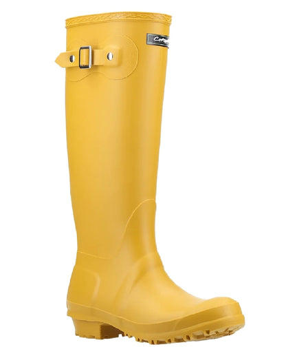 Mustard coloured Cotswold Sandringham Buckle Strap Wellingtons on white background 