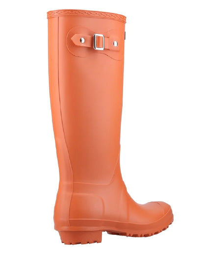 Pumpkin coloured Cotswold Sandringham Buckle Strap Wellingtons on white background 