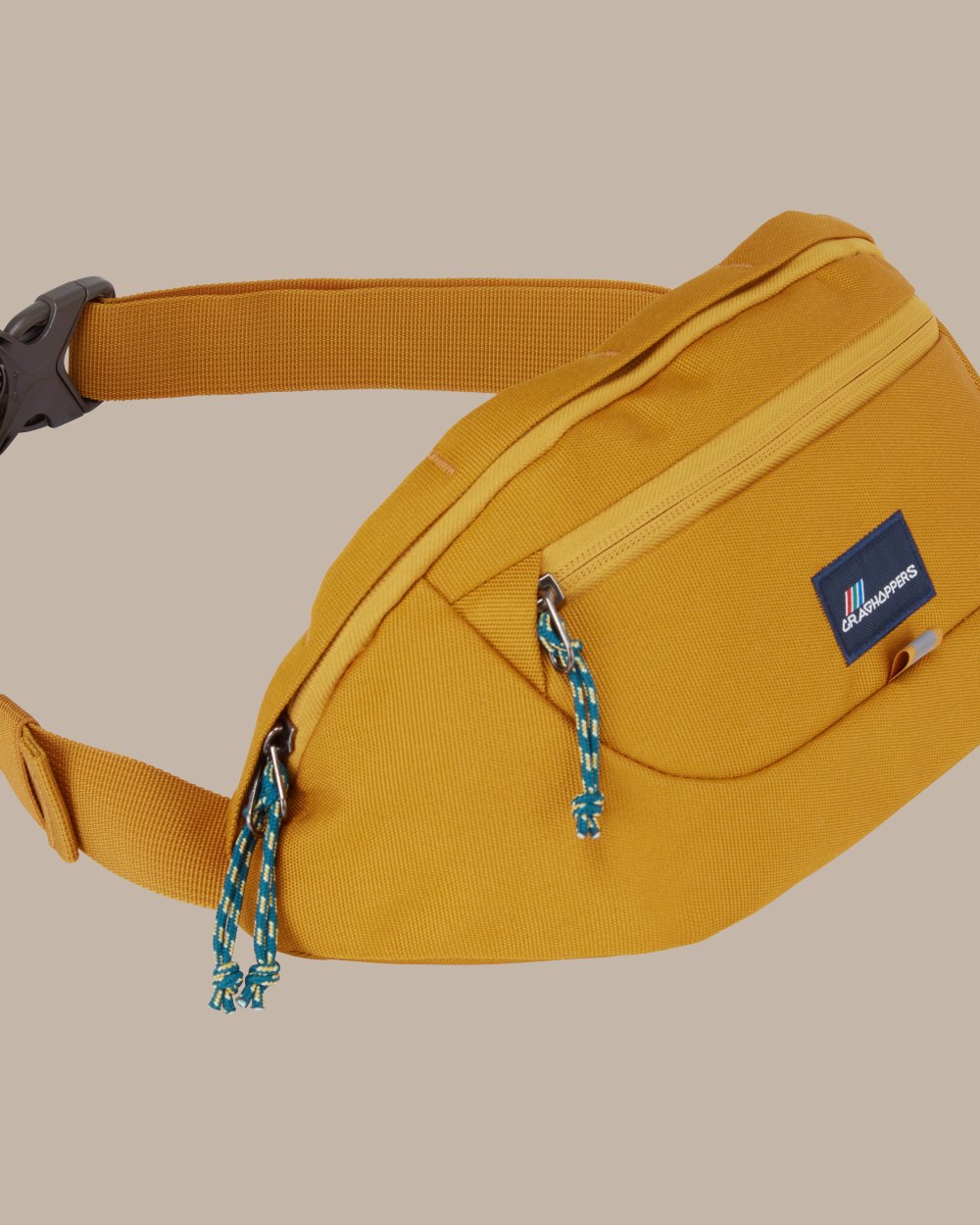 Dark Butterscotch Coloured Craghoppers 1.5 L kiwi Classic Bum Bag II on Beige Background 