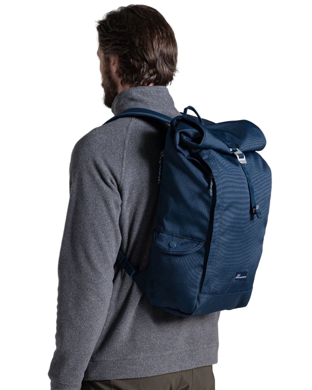 Blue Stone coloured Craghoppers 20L Kiwi Classic Rolltop Backpack II on white background 