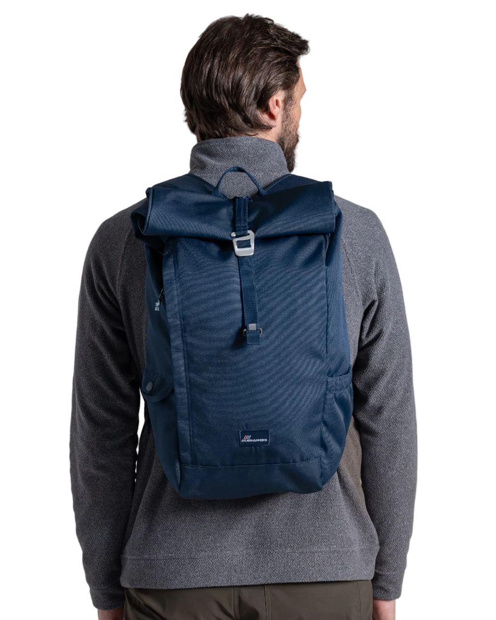 Blue Stone coloured Craghoppers 20L Kiwi Classic Rolltop Backpack II on white background 