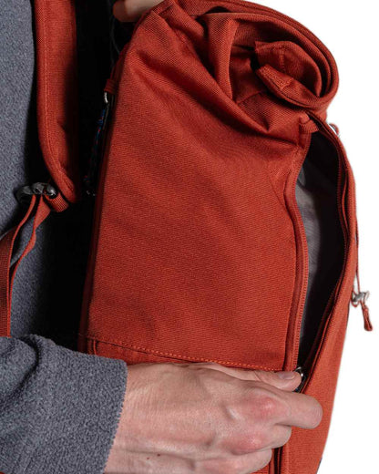 Red Beach coloured Craghoppers 20L Kiwi Classic Rolltop Backpack II on white background 