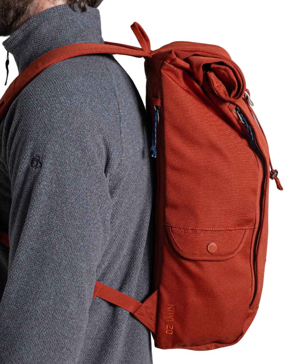 Red Beach coloured Craghoppers 20L Kiwi Classic Rolltop Backpack II on white background 