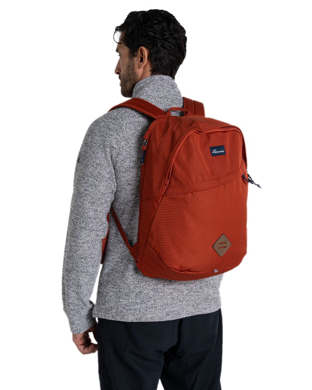 Red Beach coloured Craghoppers 22L Kiwi Classic Backpack II on white background 