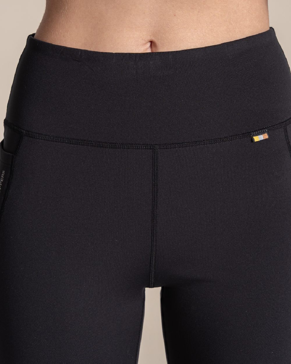Black coloured Craghoppers Alex II Legging on beige background 