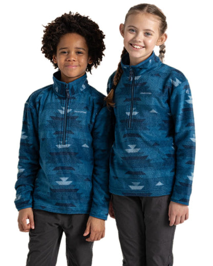 Blue Navy Print Coloured Craghoppers Childrens Calke Half Zip Fleece on white background 