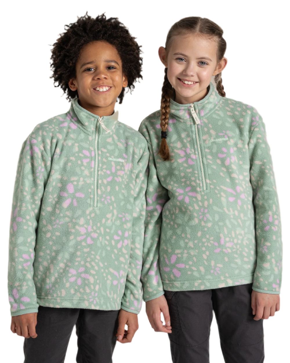 Pale Pistachio Print Coloured Craghoppers Childrens Calke Half Zip Fleece on white background 