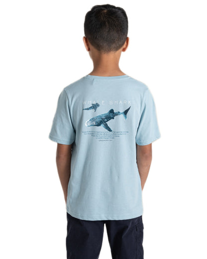 Sky Blue coloured Craghoppers Childrens Ellis Short Sleeved T-Shirt on white background 