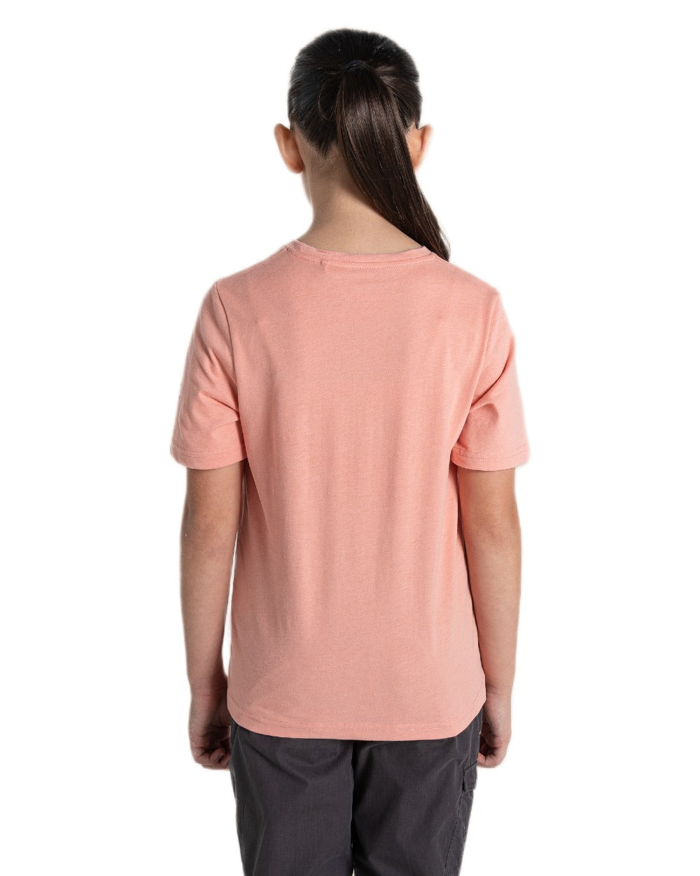 Sunset Haze coloured Craghoppers Childrens Ellis Short Sleeved T-Shirt on white background 