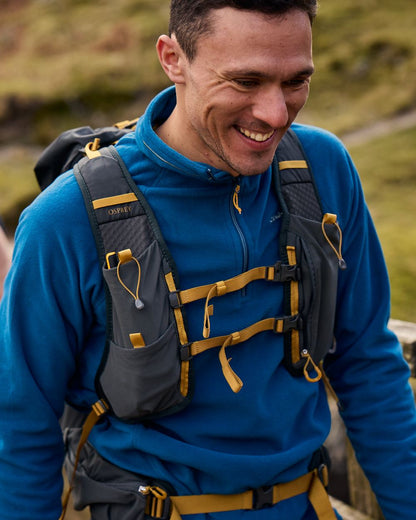 Poseidon Blue Coloured Craghoppers Corey VI Half Zip Fleece on mountain background 