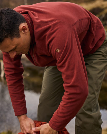 Red Jasper Coloured Craghoppers Corey VI Half Zip Fleece on mountain background 