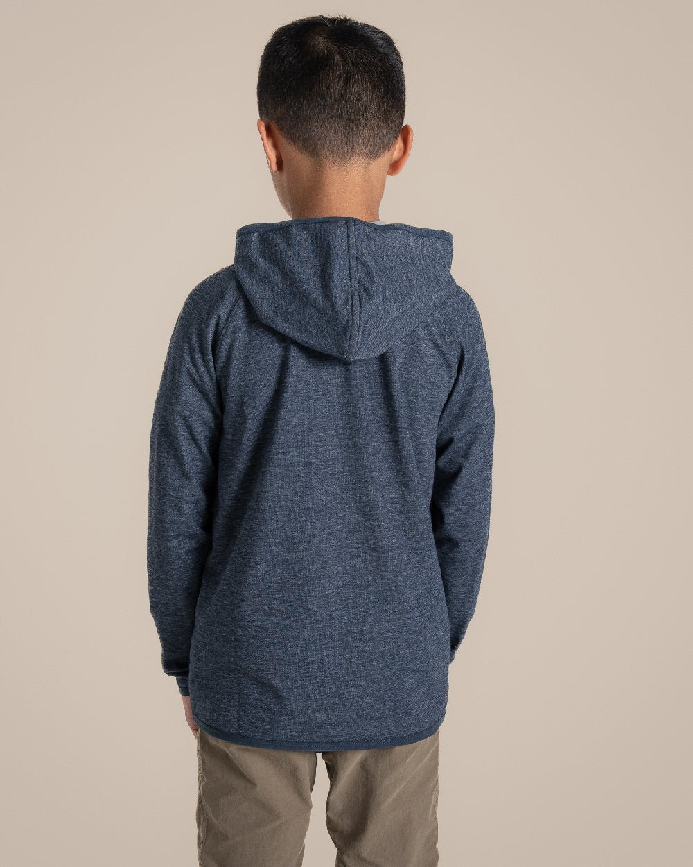 Blue Navy Marl Coloured Craghoppers Kids Nosi Life Frey Hooded Jacket on Beige Background 