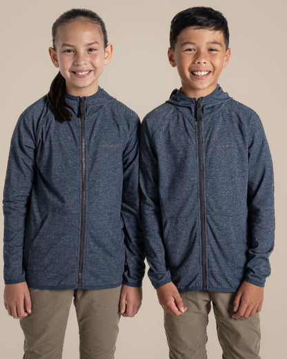 Blue Navy Marl Coloured Craghoppers Kids Nosi Life Frey Hooded Jacket on Beige Background 