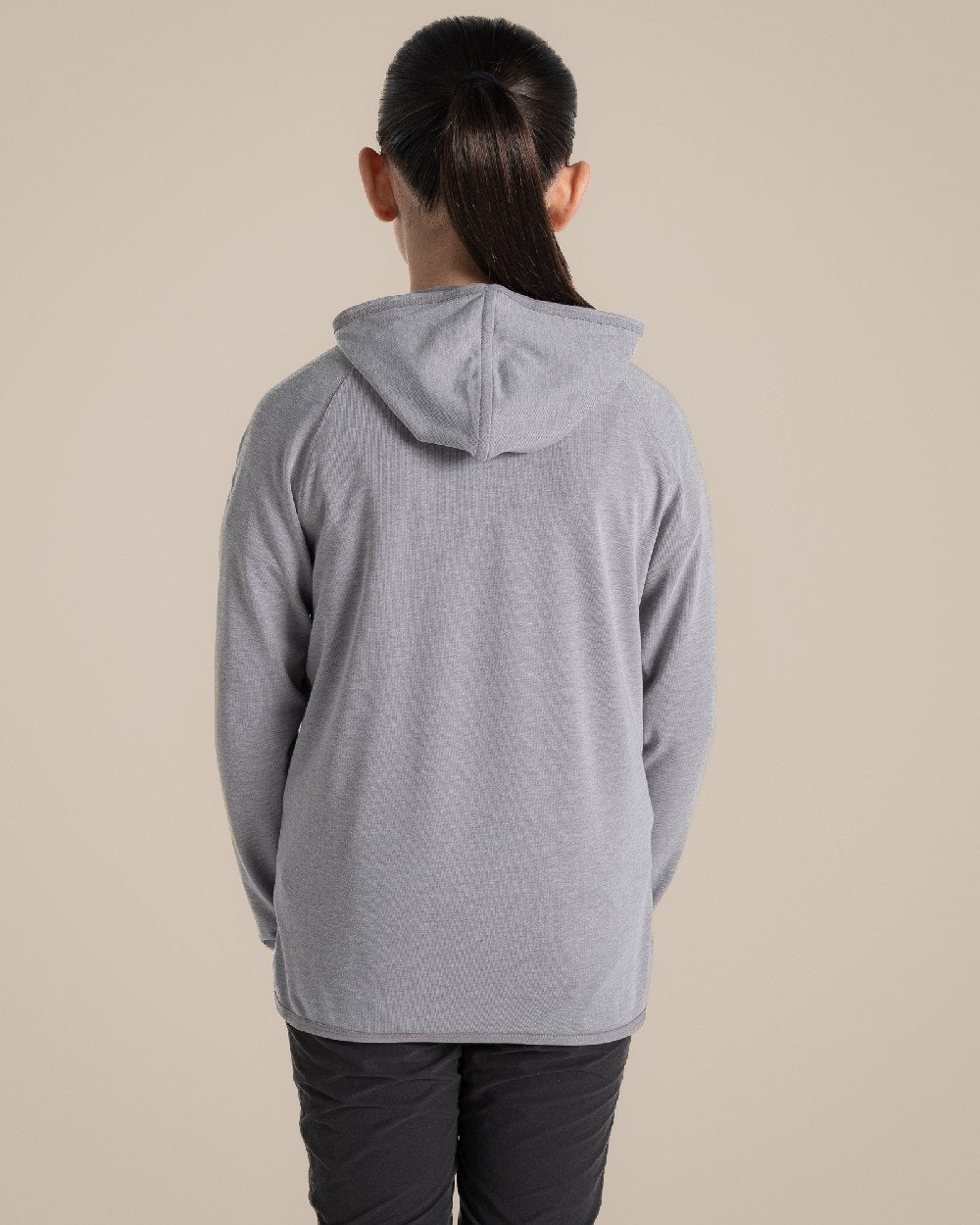 Soft Grey Marl Coloured Craghoppers Kids Nosi Life Frey Hooded Jacket on Beige Background 