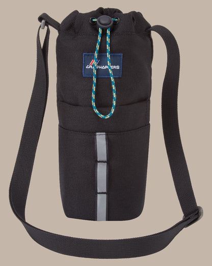 Black Coloured Craghoppers kiwi Bottle Bag II On Beige Background 