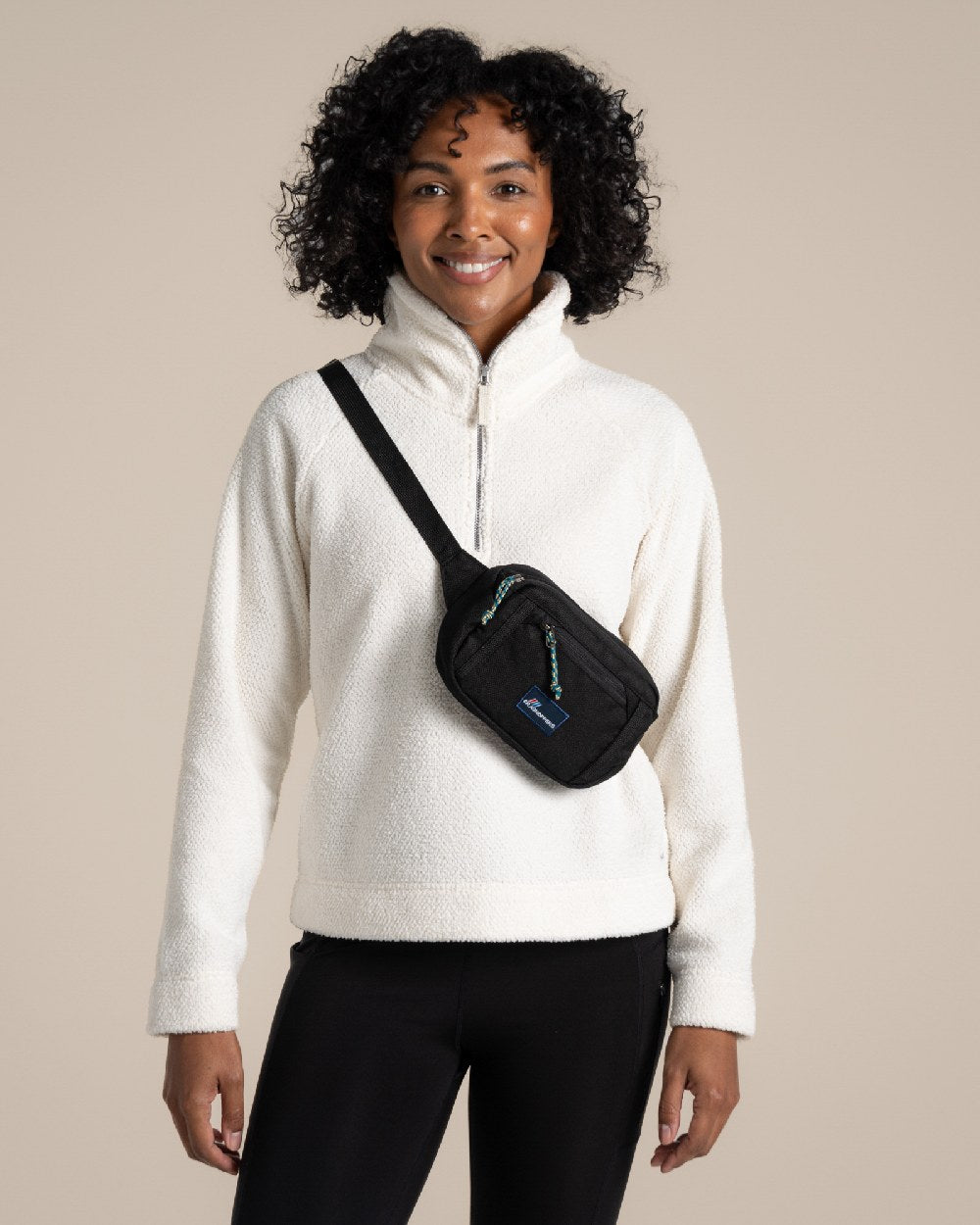 Black Coloured Craghoppers Kiwi Waistpack on Beige Background 