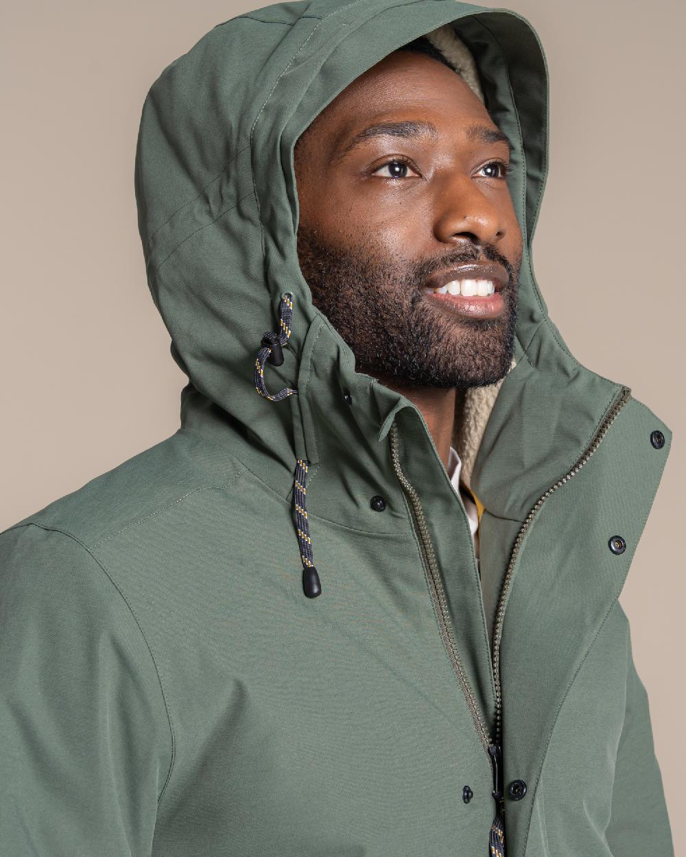 Lagano Green coloured Craghoppers Mens Agnar Jacket on beige background 