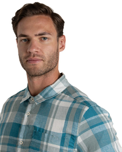 Tranquil Blue Check Coloured Craghoppers Mens Argino Short Sleeved Shirt on white background 