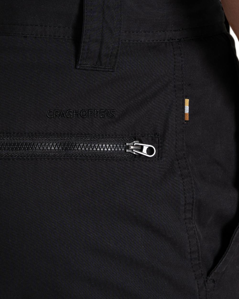 Black coloured Craghoppers Mens Brisk Trousers on white background 