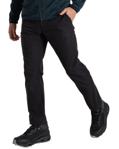 Black coloured Craghoppers Mens Brisk Trousers on white background 