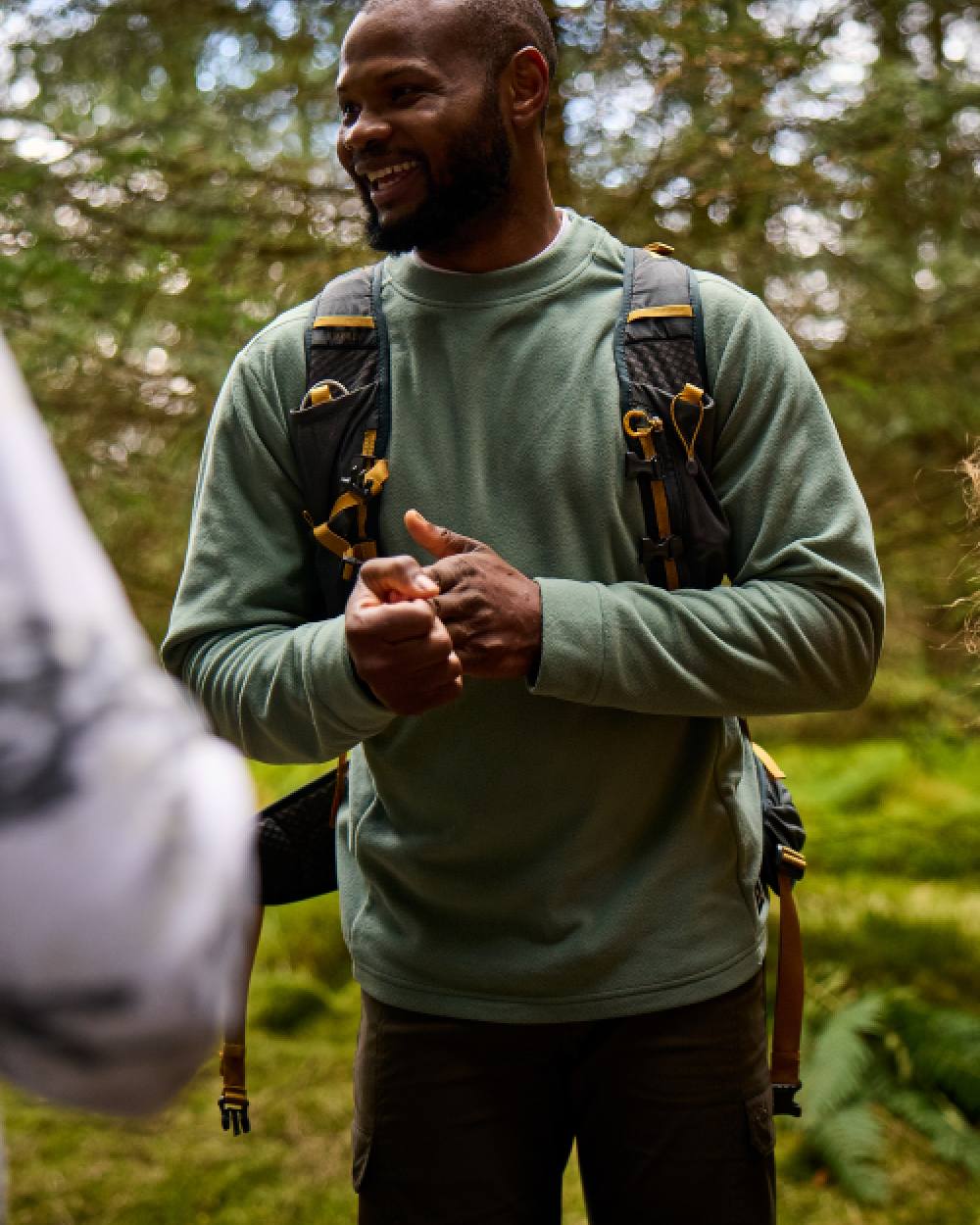 Laurel Green Coloured Craghoppers Mens Corey Crew Neck Sweaters on forest background 