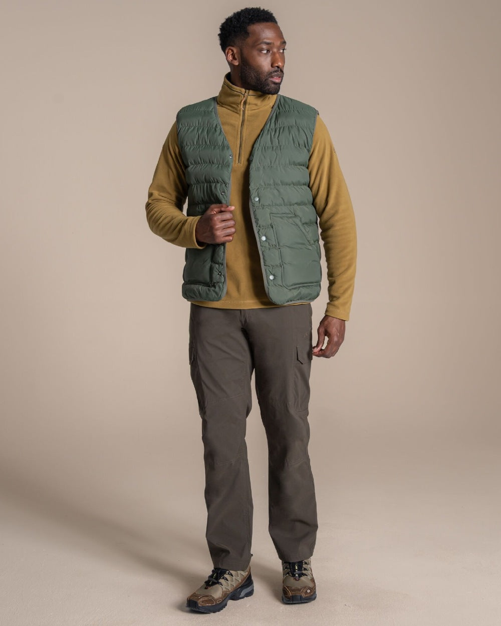 Lagano Green coloured Craghoppers Mens Dalesway Vest on beige background 