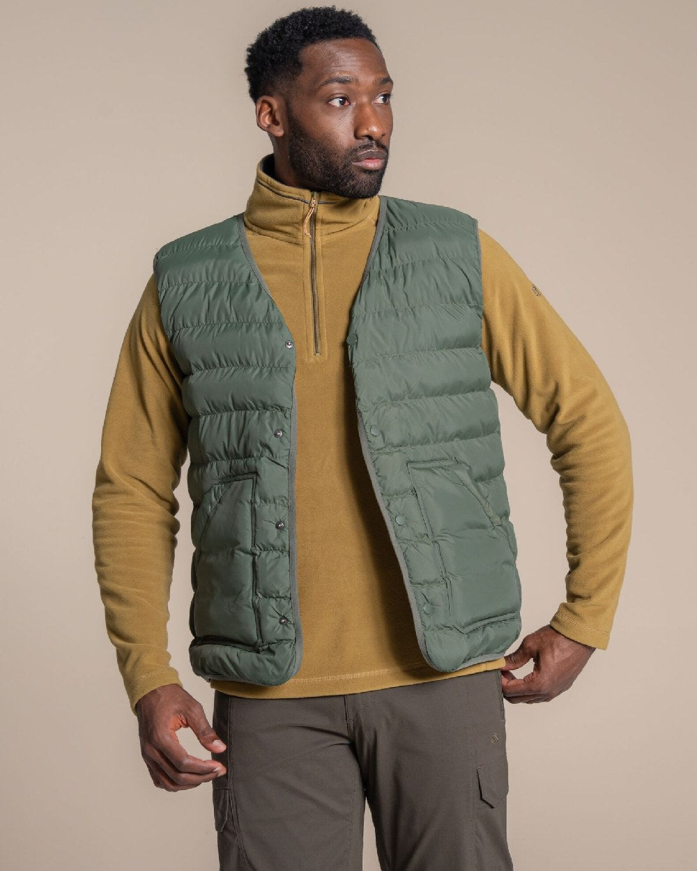 Lagano Green coloured Craghoppers Mens Dalesway Vest on beige background 