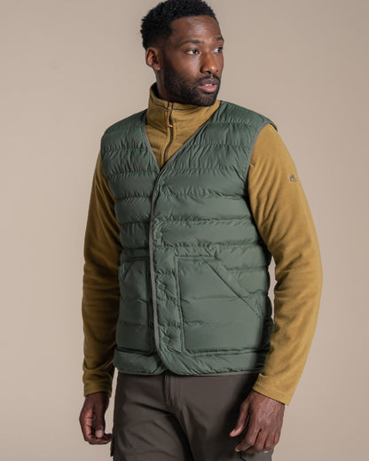 Lagano Green coloured Craghoppers Mens Dalesway Vest on beige background 