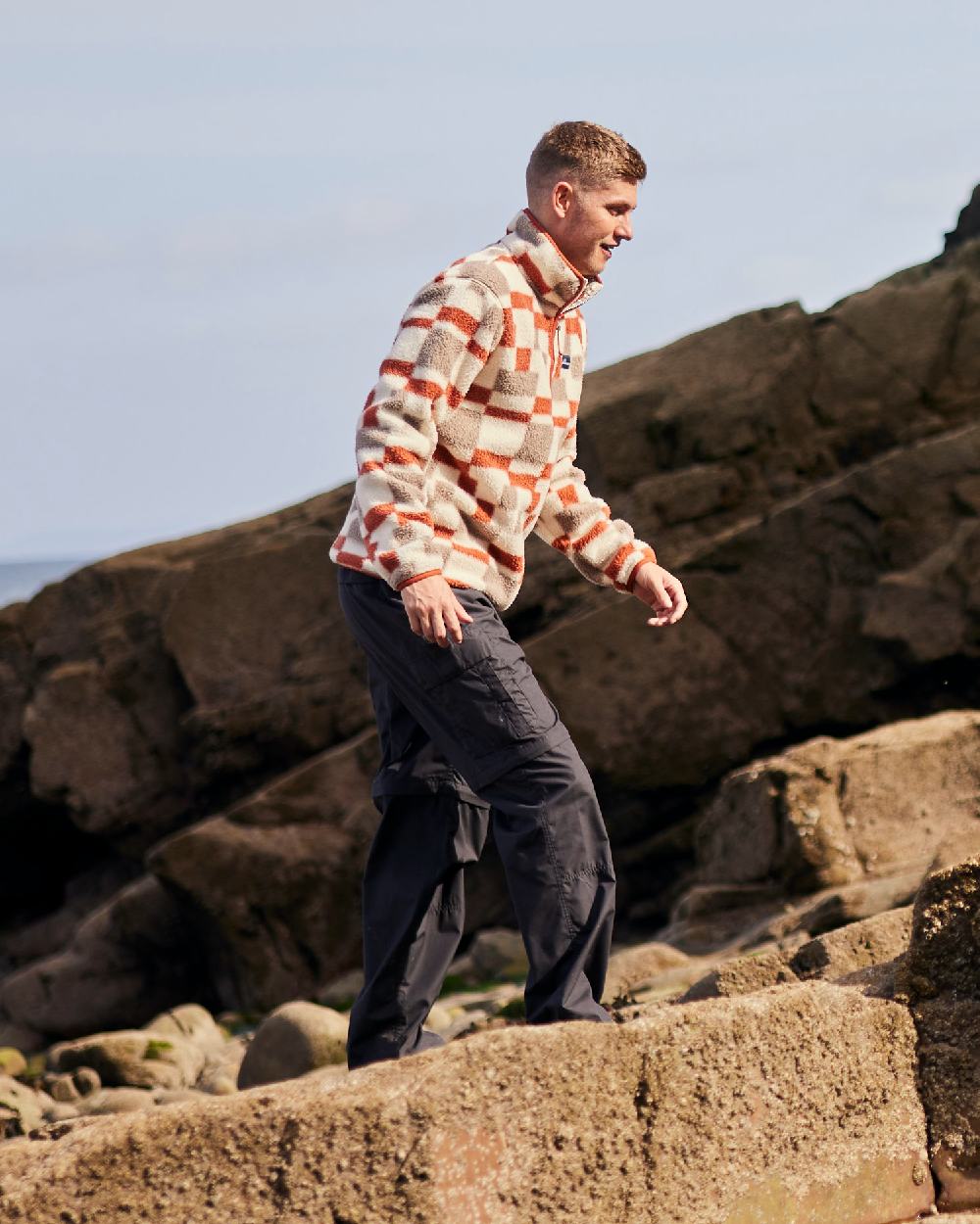 Black Coloured Craghoppers Mens Kiwi Convertible Trousers on outdoor background 