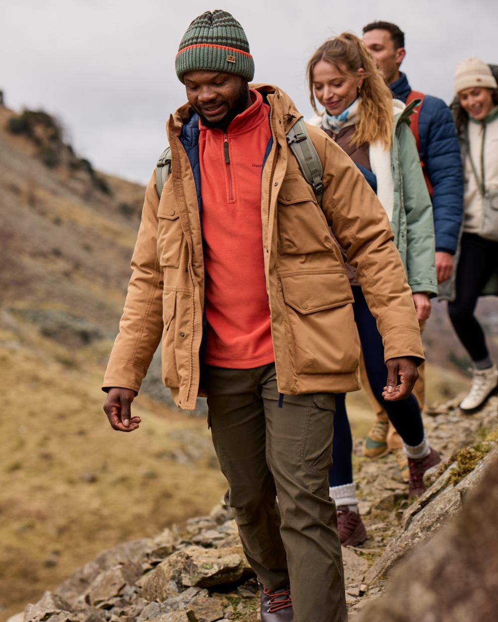 Woodland Green coloured Craghoppers Mens Kiwi Pro Cargo Trousers on mountain background 