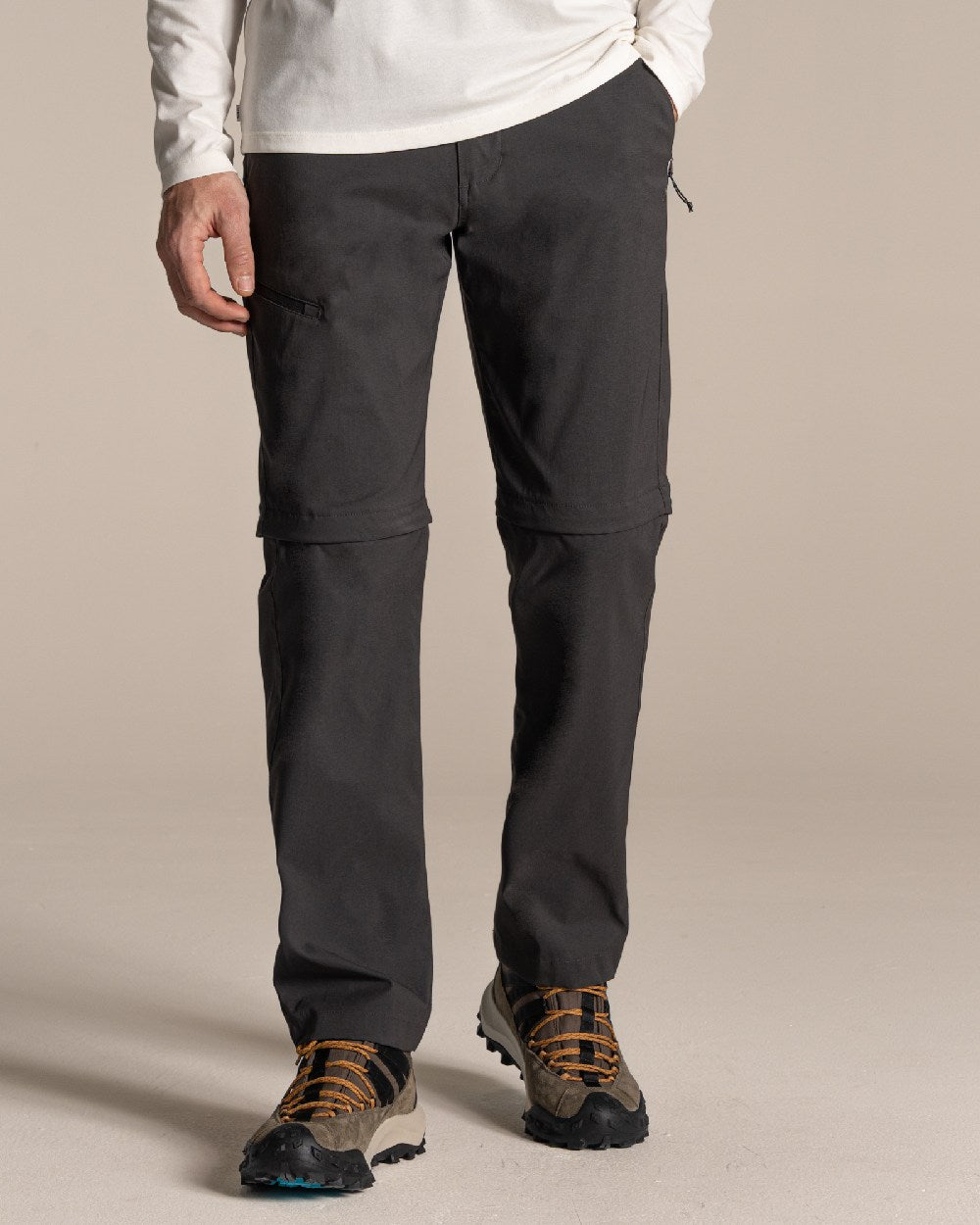 Dark Lead Coloured Craghoppers Mens Kiwi Pro III Convertible Trouser on Beige Background 