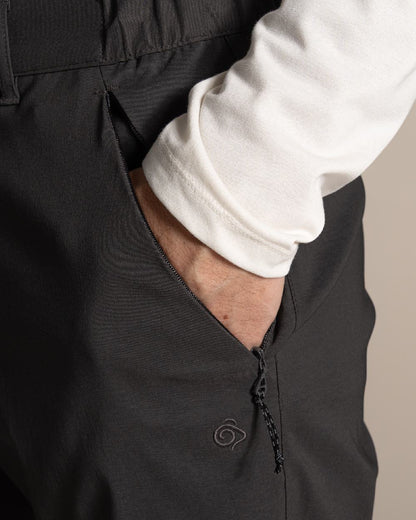 Dark Lead Coloured Craghoppers Mens Kiwi Pro III Convertible Trouser on Beige Background 