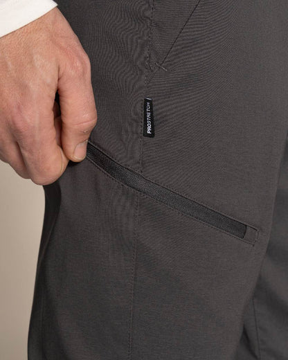Dark Lead Coloured Craghoppers Mens Kiwi Pro III Convertible Trouser on Beige Background 