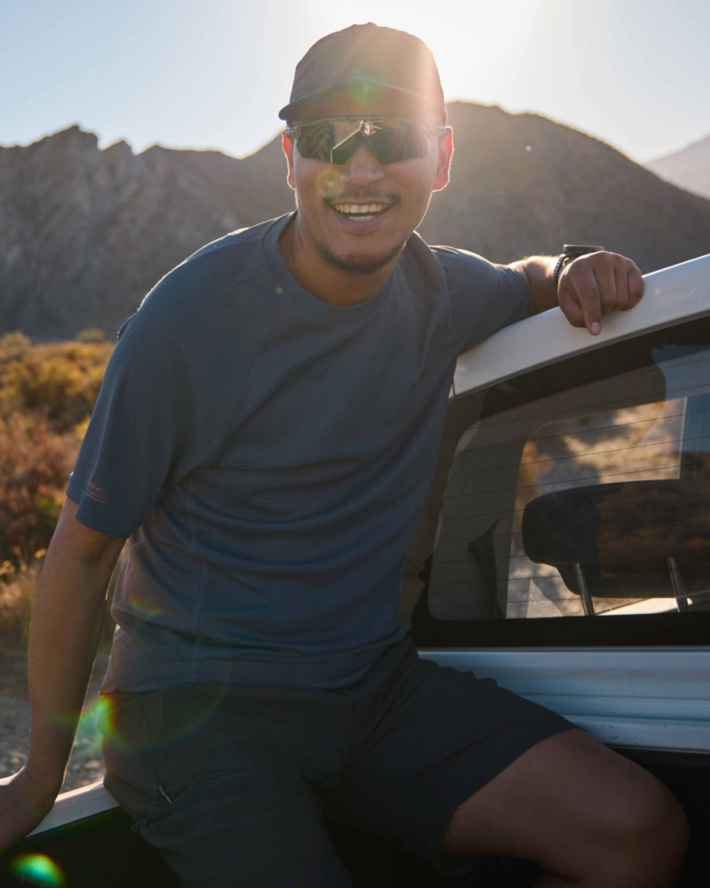 Dark Lead coloured Craghoppers Mens Kiwi Pro III Shorts on mountain background 