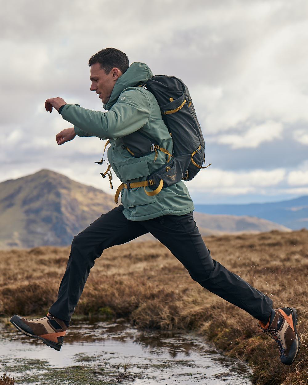 Black Coloured Craghoppers Mens Kiwi Pro III Trousers on outdoor background 