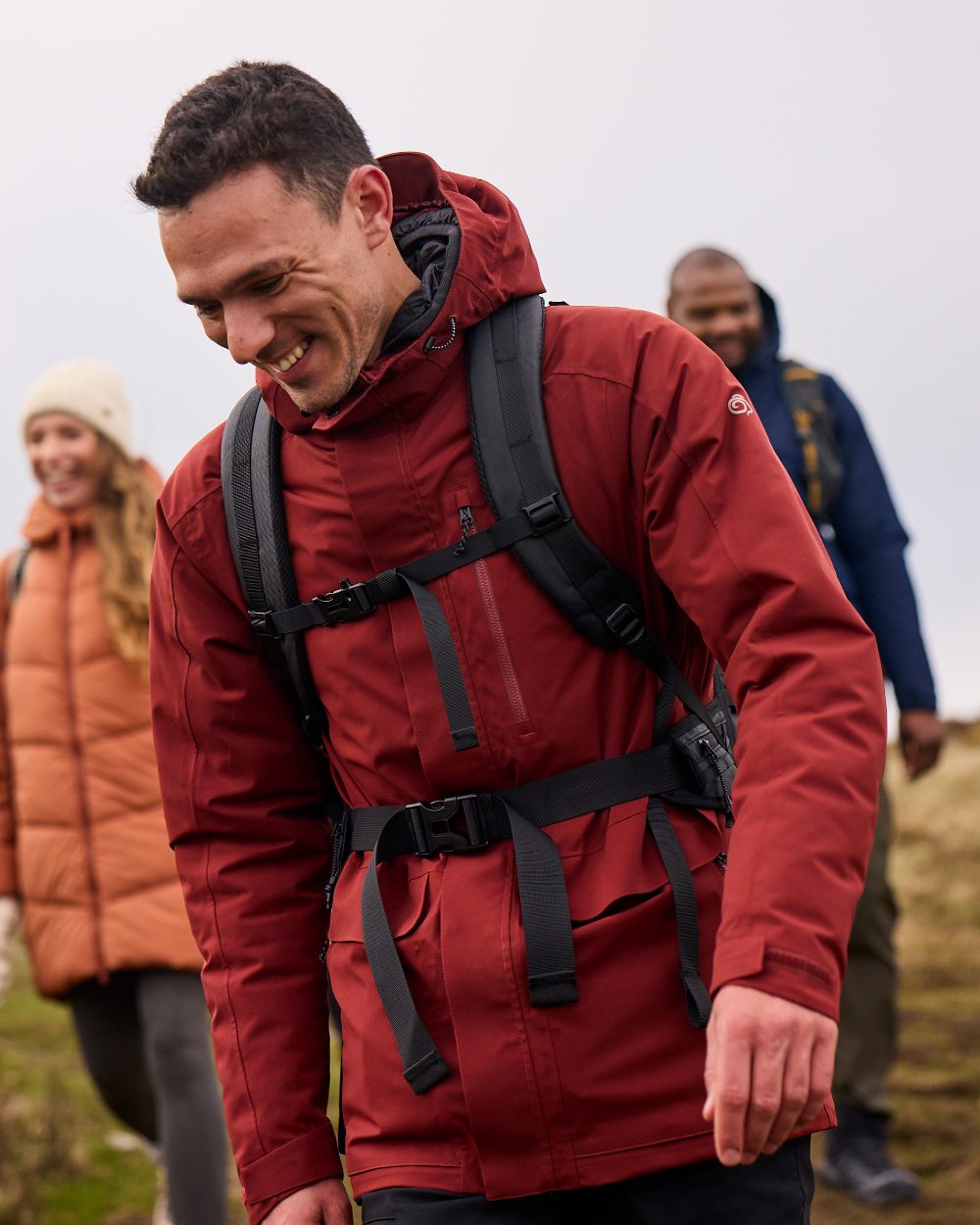 Red Jasper coloured Craghoppers Mens Lorton II Waterproof Jacket on mountain background 