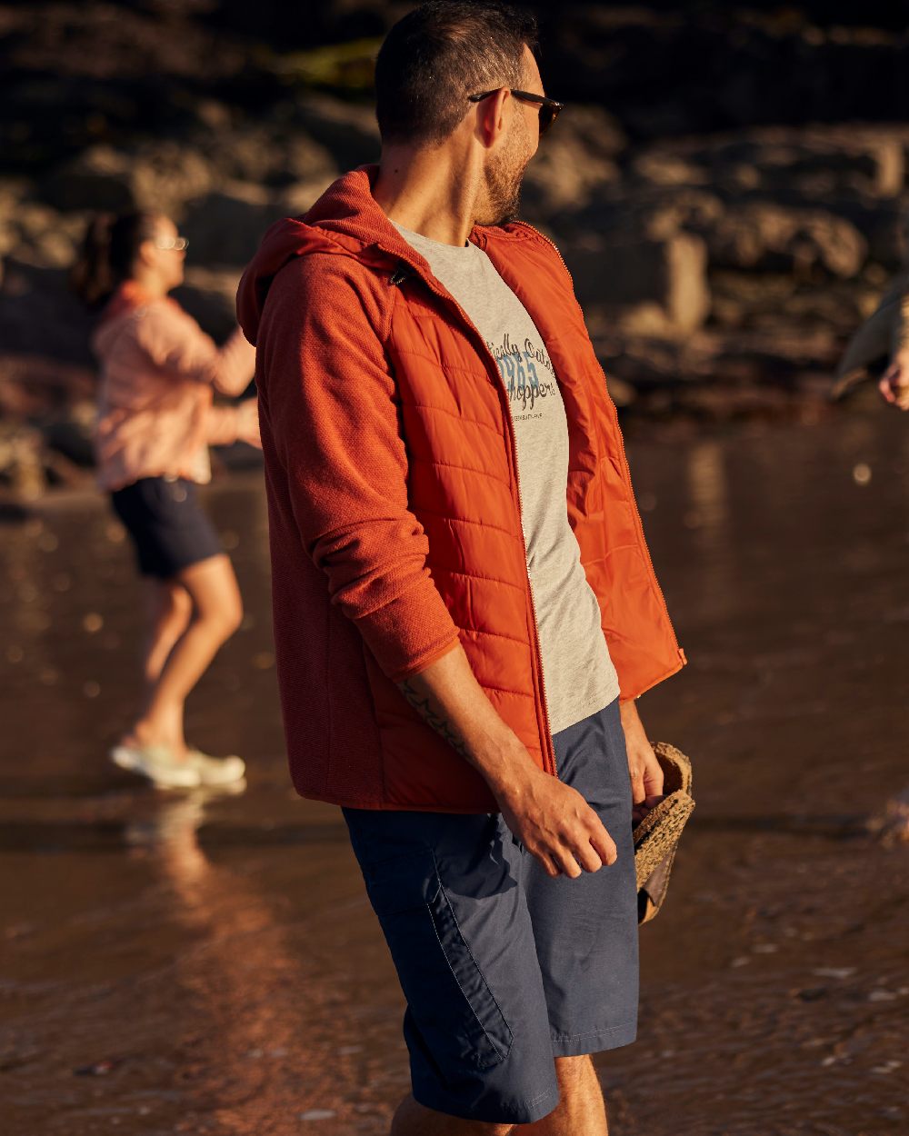 Light Grey Marl Coloured Craghoppers Mens Lucent II Short Sleeved T-Shirt on beach Background
