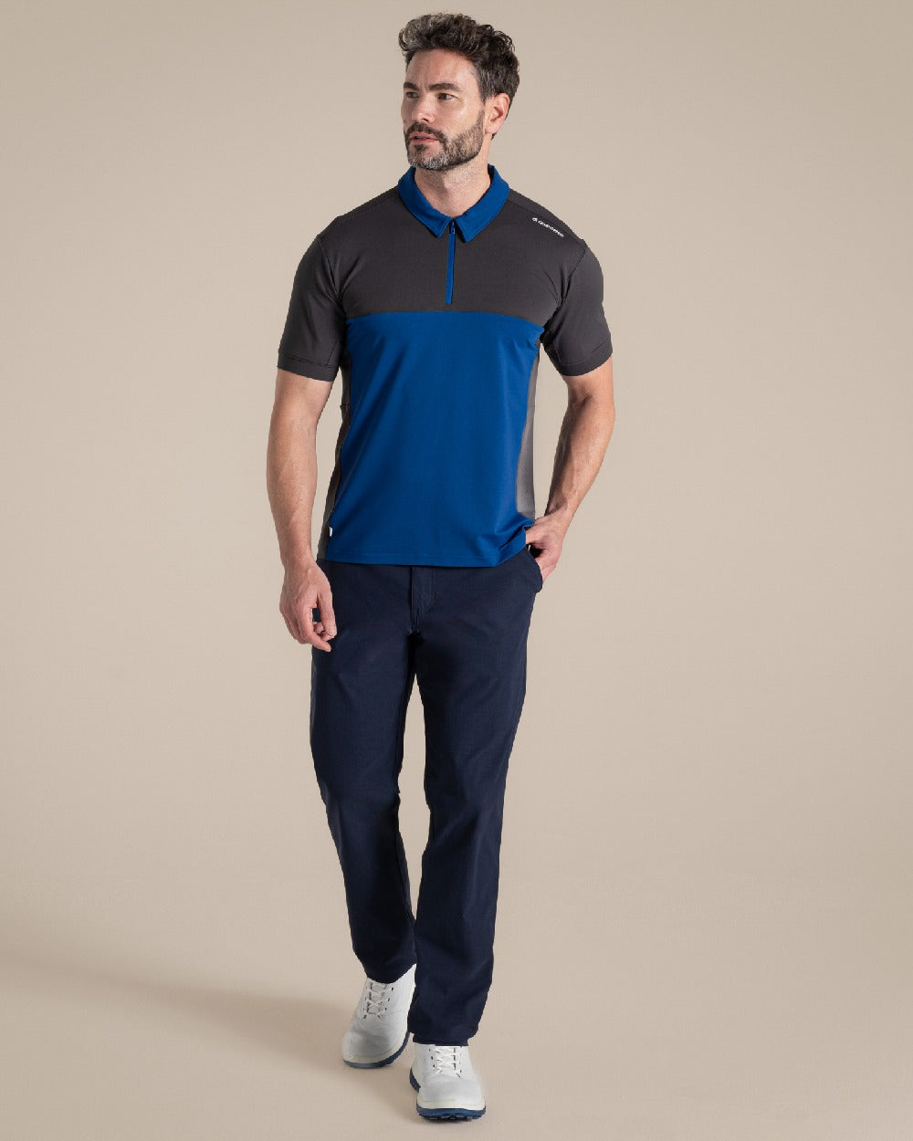 Dark Iron Deep Marina Coloured Craghoppers Mens Nosilife Avro Polo Top on Beige Background 
