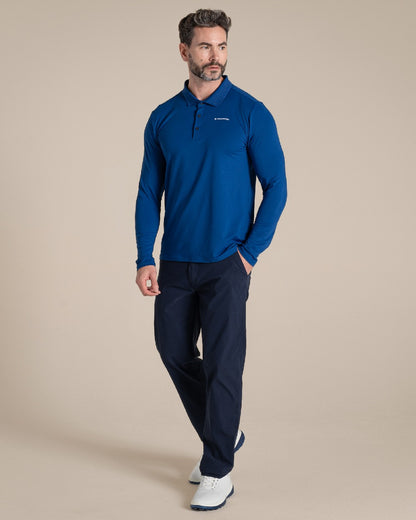 Deep Marina Coloured Craghoppers mens Nosilife Bramshaw Long Sleeved Polo Top on Beige Background 
