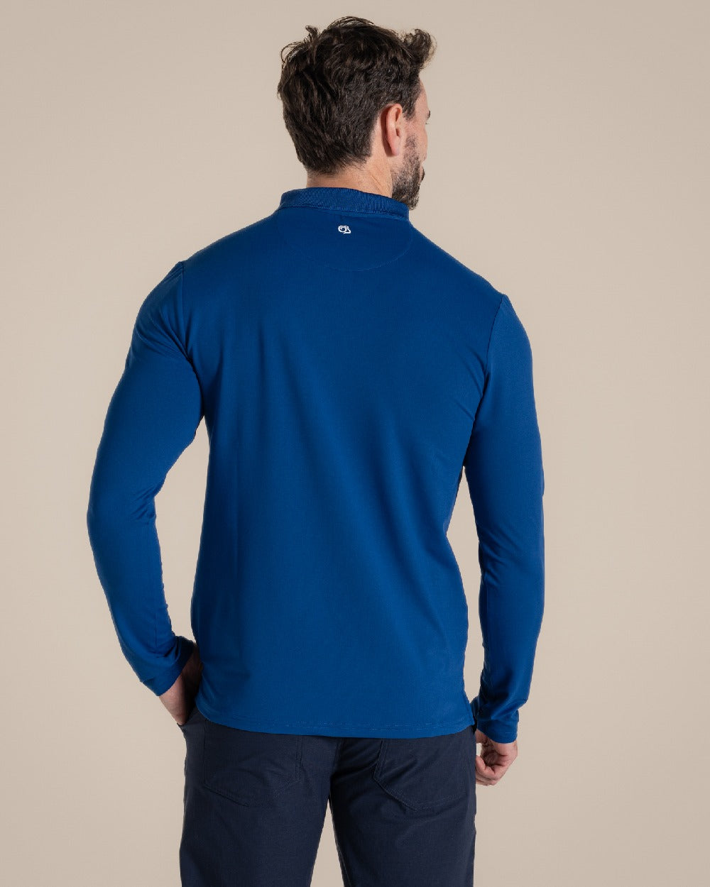 Deep Marina Coloured Craghoppers mens Nosilife Bramshaw Long Sleeved Polo Top on Beige Background 
