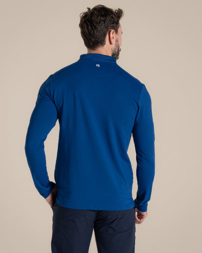 Deep Marina Coloured Craghoppers mens Nosilife Bramshaw Long Sleeved Polo Top on Beige Background 