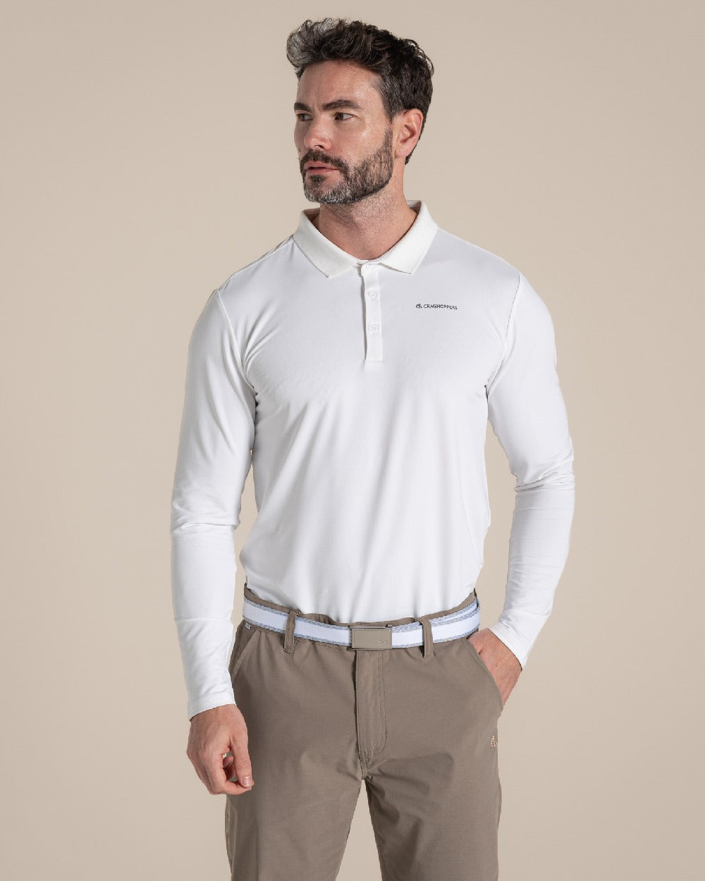 White Coloured Craghoppers mens Nosilife Bramshaw Long Sleeved Polo Top on Beige Background 