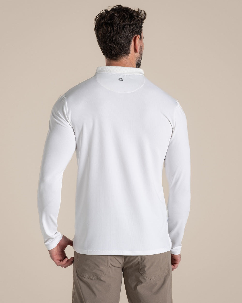 White Coloured Craghoppers mens Nosilife Bramshaw Long Sleeved Polo Top on Beige Background 